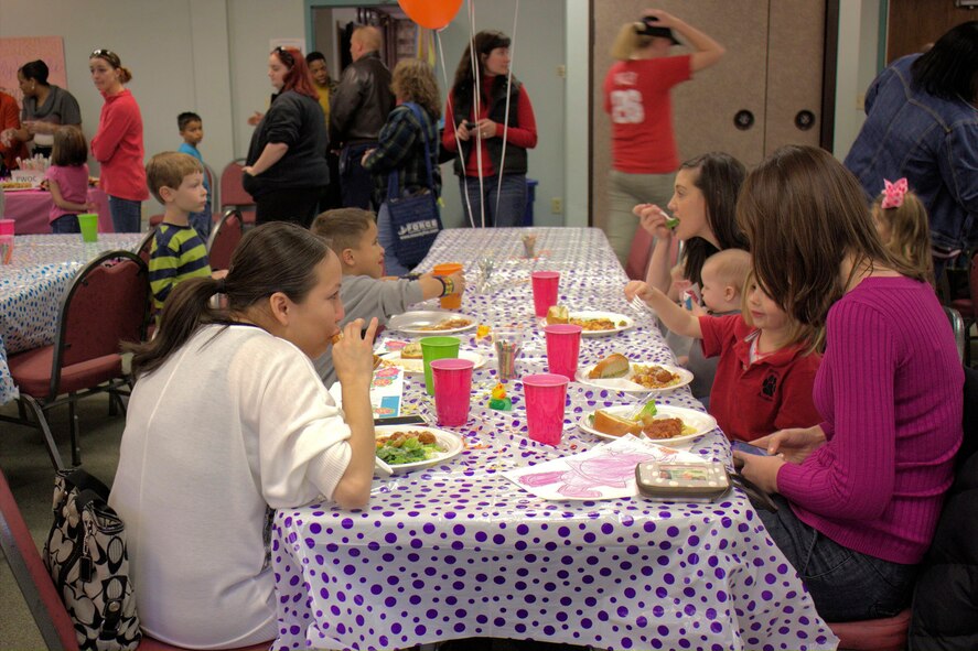 Families take part in a Deployed Spouses Dinner March 26, 2013, at Moody Air Force Base, Ga. The Liberty Moody Keystone Club hosted the event to provide families with a free meal and a chance to interact with each other. (Courtesy photo) 