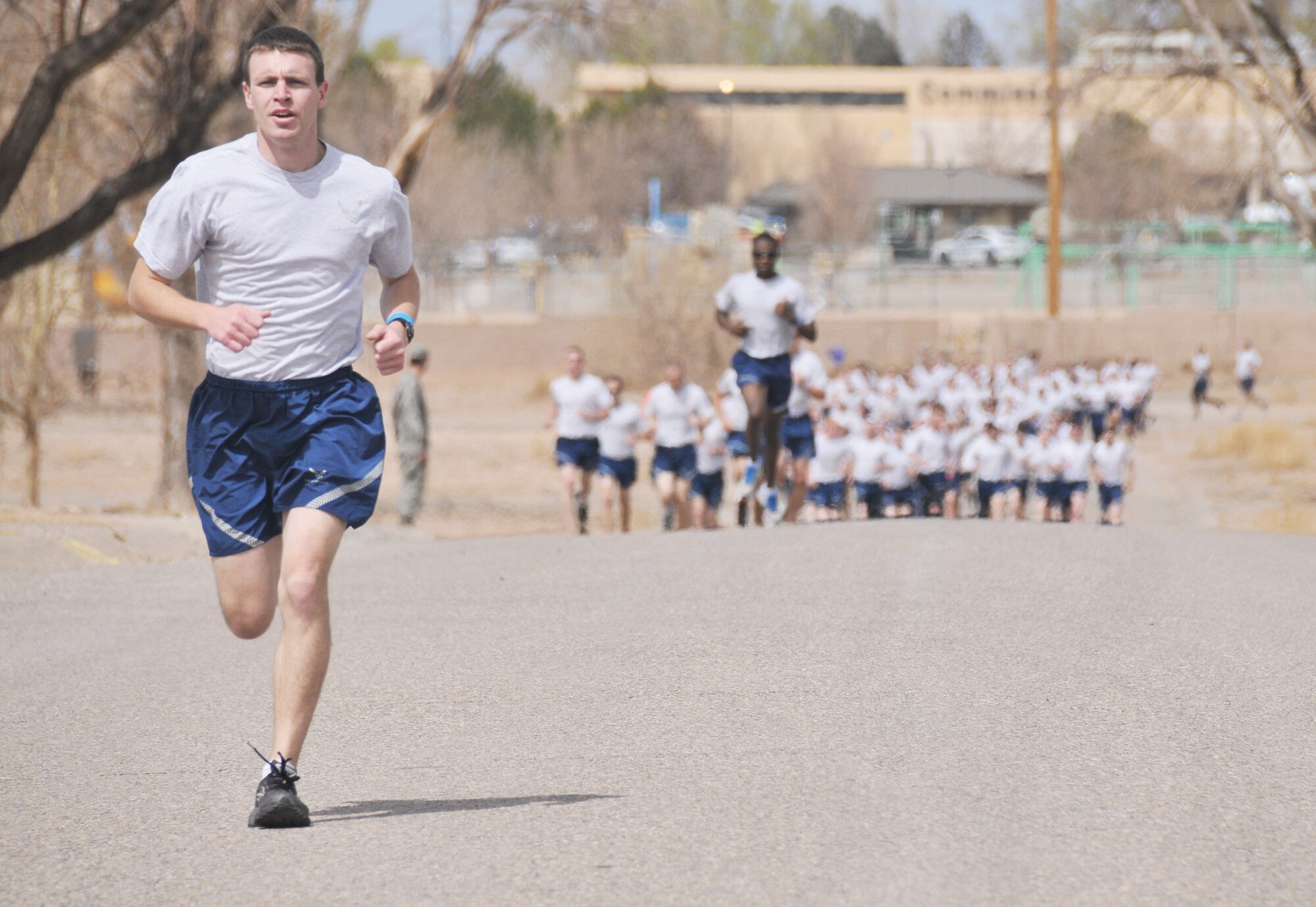Airman 1st Class Ryan Rebain, 377th Force Support Squadron, takes an early lead March 27 during the Tiger Run. Rebain finished first out of more than 100 Team Kirtland Airmen. (U.S. Air Force photo by Ken Moore)