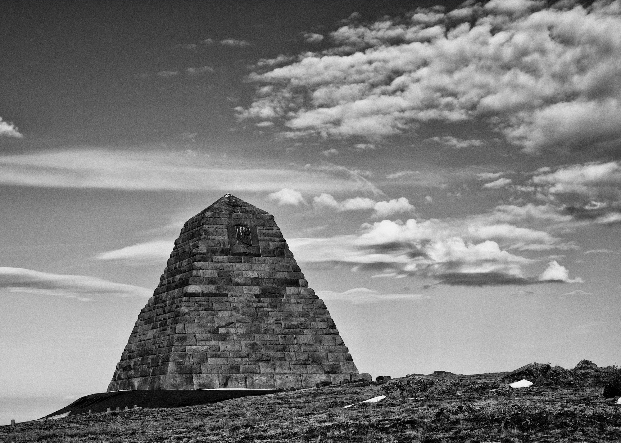 Built in 1881, the Ames Monument stands on the location where Sherman, Wyoming once was. The site of the old rail town is just south of I-80 and can be accessed by making a left after taking exit 329. Built to honor the influential work of Oliver and Oakes Ames in constructing the transcontinental railroad, the 60 foot tall limestone pyramid stands out in the otherwise empty landscape with a backdrop of the Rocky Mountains in the distance. (U.S. Air Force photo by Matt Bilden)
