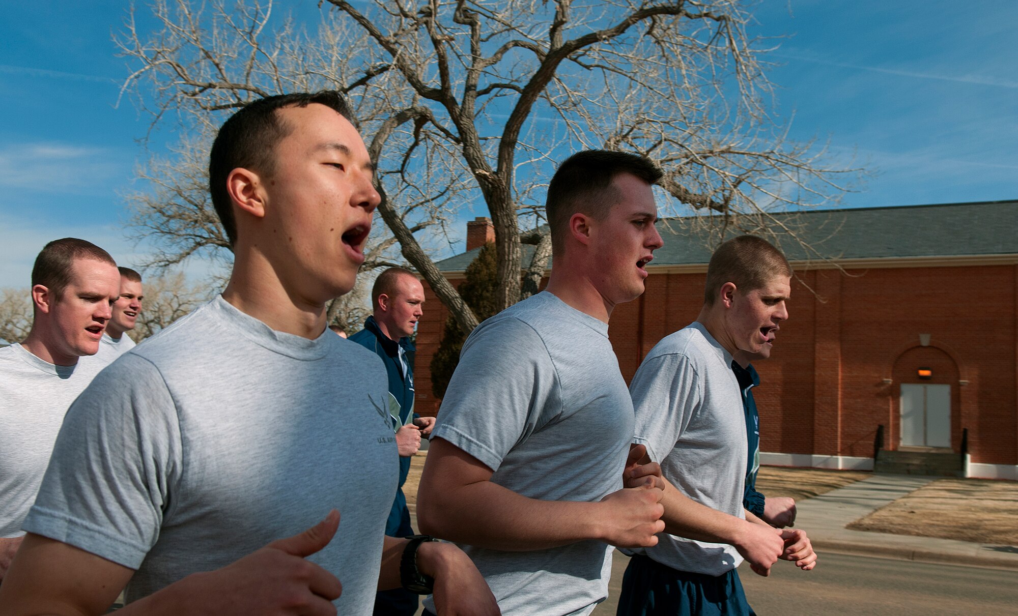 Airmen of the 90th Security Forces Group of F. E. Warren Air Force Base sing cadence as the take part in their group’s two-mile “pride run” March 29. (U.S. Air Force photo by R.J. Oriez) 