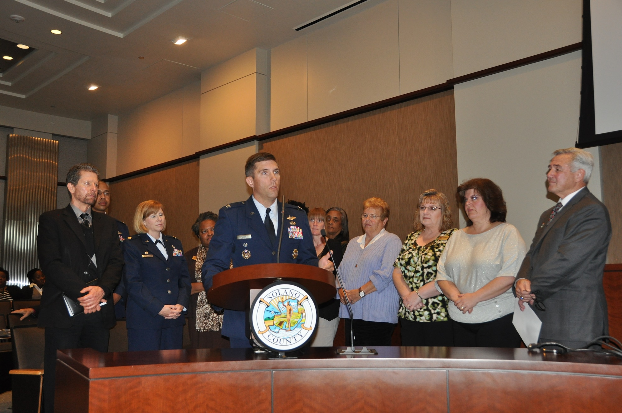 Col. John Klein, 60th Air Mobility Wing vice commander, is presented the Month of the Military Child resolution at the Solano County Board of Supervisors meeting in Fairfield April 2. Month of the Military Child recognizes the sacrifices and courage of military children. (U.S. Air Force photo/1st Lt. Angela Martin)