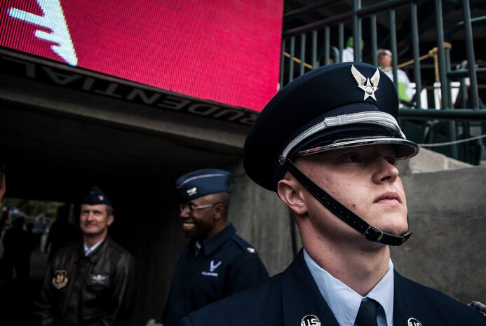 Airman 1st Class Alex Stoll, Joint Base Charleston Honor Guard member, is ready to post the Colors April 3, 2013, at the Family Circle Cup Tennis Tournament in Daniel Island, S.C. A five-member honor guard team posted the Colors and base leaders had the honor of conducting the coin toss prior to the match. (U.S. Air Force photo/ Senior Airman Dennis Sloan)