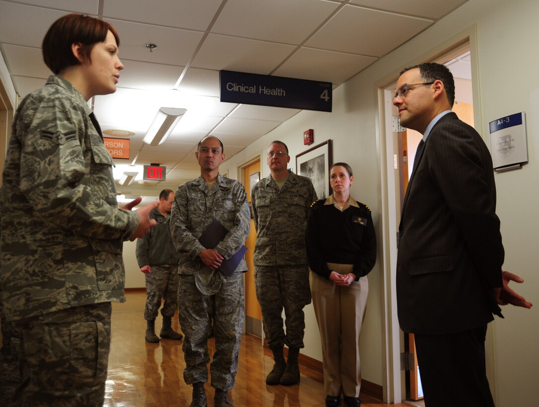 Airman 1st Class Valerie Stemac, 779th Medical Group mental health technician, briefs Assistant Secretary of the Air Force, Daniel B. Ginsberg on April 2, 2013 at Joint Base Andrews, Md..  The 79 MDW is a mission partner on Joint Base Andrews with two subordinate units; the 779th Medical Group on Joint Base Andrews and the 579th Medical Group on Joint Base Anacostia-Bolling. Air Force medics also work at Walter Reed National Military Medical Center, Fort Belvoir Community Hospital, Fort Meade and the Pentagon. The 79th Medical Wing is a tenant unit on Andrews, and headquartered at Malcolm Grow Medical Clinic. and Surgery Center. (U.S. Air Force photo/Airman 1st Class Erin O'Shea)
