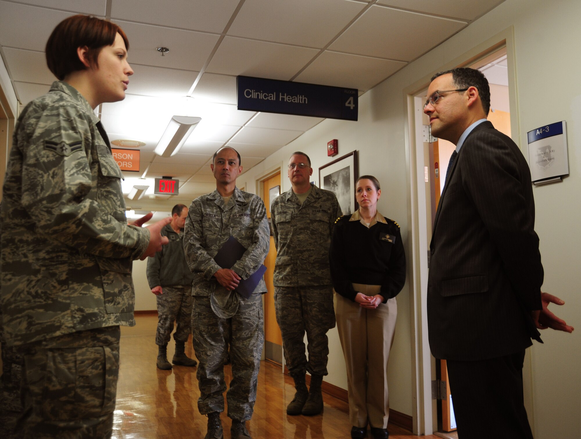 Airman 1st Class Valerie Stemac, 779th Medical Group mental health technician, briefs Assistant Secretary of the Air Force, Daniel B. Ginsberg on April 2, 2013 at Joint Base Andrews, Md..  The 79 MDW is a mission partner on Joint Base Andrews with two subordinate units; the 779th Medical Group on Joint Base Andrews and the 579th Medical Group on Joint Base Anacostia-Bolling. Air Force medics also work at Walter Reed National Military Medical Center, Fort Belvoir Community Hospital, Fort Meade and the Pentagon. The 79th Medical Wing is a tenant unit on Andrews, and headquartered at Malcolm Grow Medical Clinic. and Surgery Center. (U.S. Air Force photo/Airman 1st Class Erin O'Shea)
