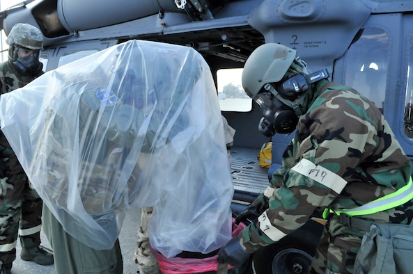 Rescue Airmen are put to the test by Air Combat Command during an Operational Readiness Inspection being held in Savannah Ga. Reservists are evaluated on scenarios that mimic what they may find while deployed in a combat environment, to include working in a chemical environment. (U.S. Air Force photo/Tech. Sgt. Peter Dean/Released)