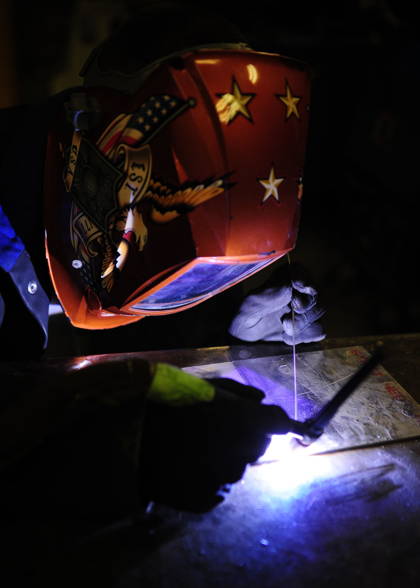 SOUTHWEST ASIA -- Staff Sgt. Todd Mathis, a metals technology craftsman from the 379th Expeditionary Aircraft Maintenance Squadron Aircraft Metals Technology Shop, uses a tungsten inert gas welder to bond two aluminum pieces together. Known as Metals Shop, their mission is to support aircraft and air ground equipment with skills in metal work; the only shop capable of working and welding exotic metals such as titanium, cobalt and nickel alloy. Metals Shop also fabricates aircraft parts and metal objects that no longer exist in supply inventory, thus keeping aircraft flying. (U.S. Air Force photo/Master Sgt. Brendan Kavanaugh)
