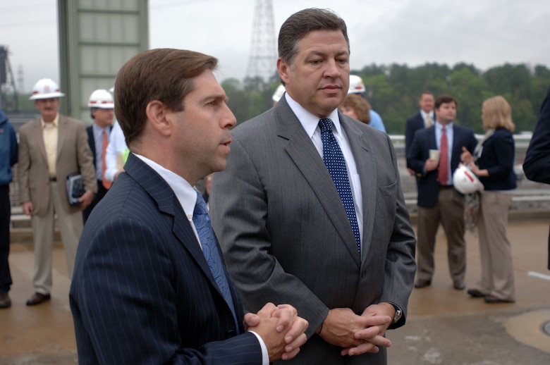 Congressman Chuck Fleischmann (Left), representative of the 3rd District of Tennessee, and Congressman Bill Shuster, representative of the 9th District of Pennsylvania, answer media questions during a tour of Chickamauga Lock in Chattanooga, Tenn., March 23, 2012.  Fleischmann invited Shuster, chairman of the Subcommittee on Railroads, Pipelines and Hazardous Materials of the House and Infrastructure Committee, to tour the construction site of a new lock that is currently not appropriated for completion.