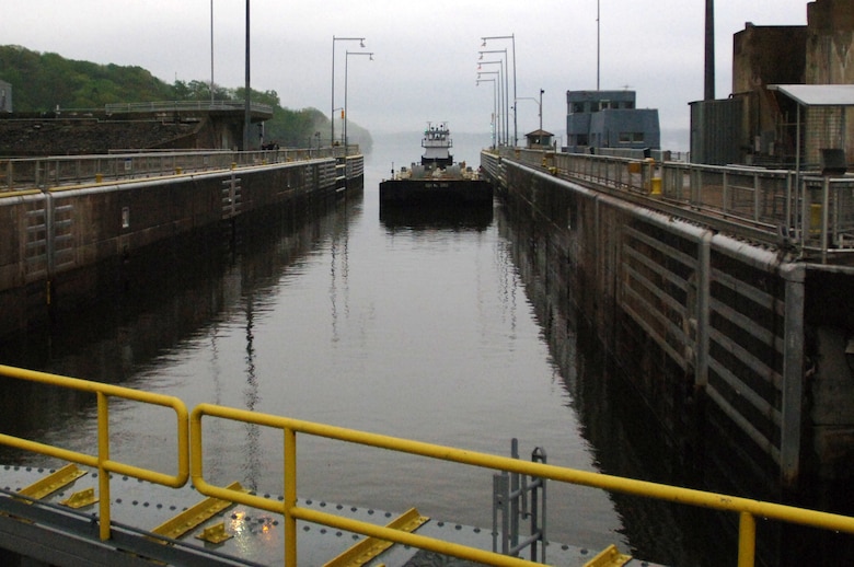 A barge enters Chickamauga Lock in Chattanooga, Tenn., March 23, 2012.