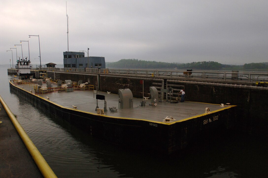 A barge enters Chickamauga Lock in Chattanooga, Tenn., March 23, 2012. 