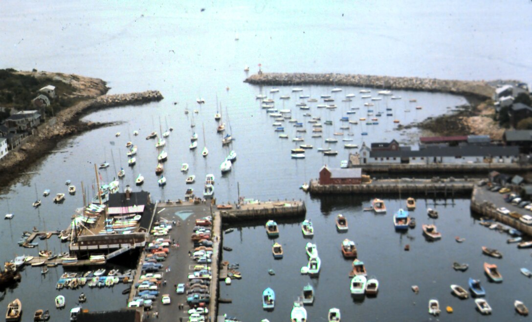 Aerial view of Rockport Harbor. Rockport Harbor is located in Sandy Bay on the northeast side of Cape Ann, about 32 miles northeast of Boston, MA. 