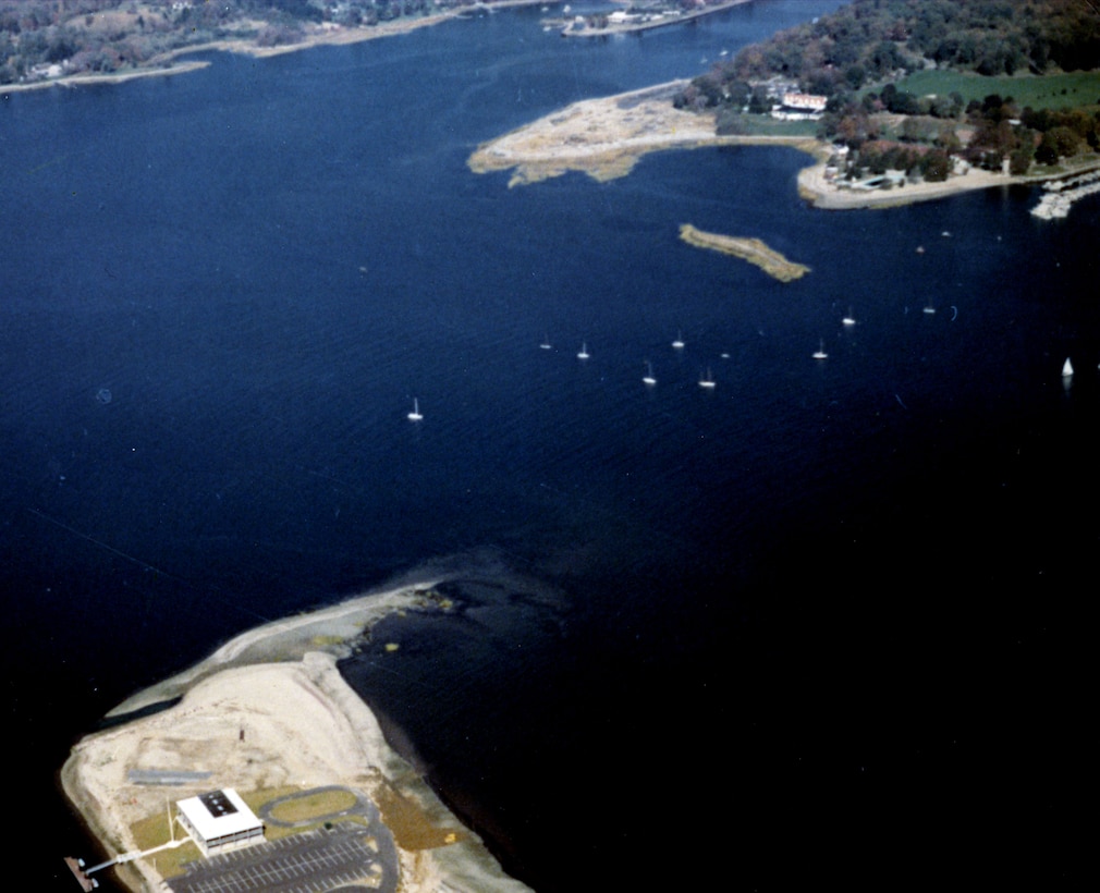 Aerial view of Westport Harbor. The Saugatuck River flows through Westport Harbor and empties into Long Island Sound at the southwestern end of Westport. The river is navigable from its mouth at the Saugatuck section of Westport to the U.S. Route 1 Bridge in Westport, CT a distance of 4.2 miles. Photo was taken in Oct. 1967.
