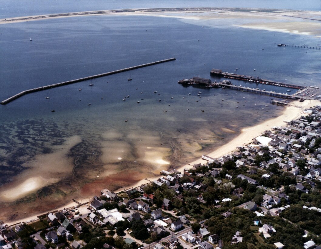 Aerial view of  Provincetown Harbor. Provincetown Harbor in Provincetown, MA lies in the bight of the northernmost section of Cape Cod, 40 miles southeast of Boston Harbor and 24 miles northeast of the Cape Cod Canal. Photo taken June 1982.