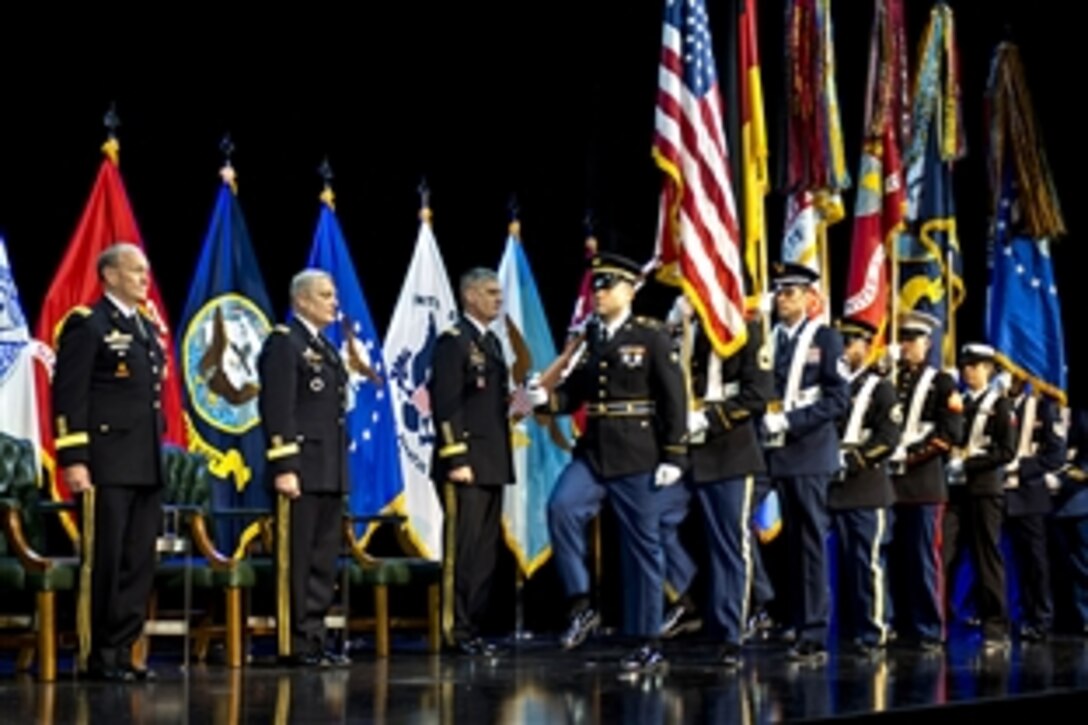 U.S. Army Gen. Martin E. Dempsey, left, chairman of the Joint Chiefs of Staff, U.S. Army Gen. Carter F. Ham, second from left, and U.S. Army Gen. David M. Rodriguez stand during a U.S. Africa Command ceremony in Stuttgart, Germany, April 5, 2013. During the event, Rodriquez assumed command from Ham, becoming Africom's third leader.
