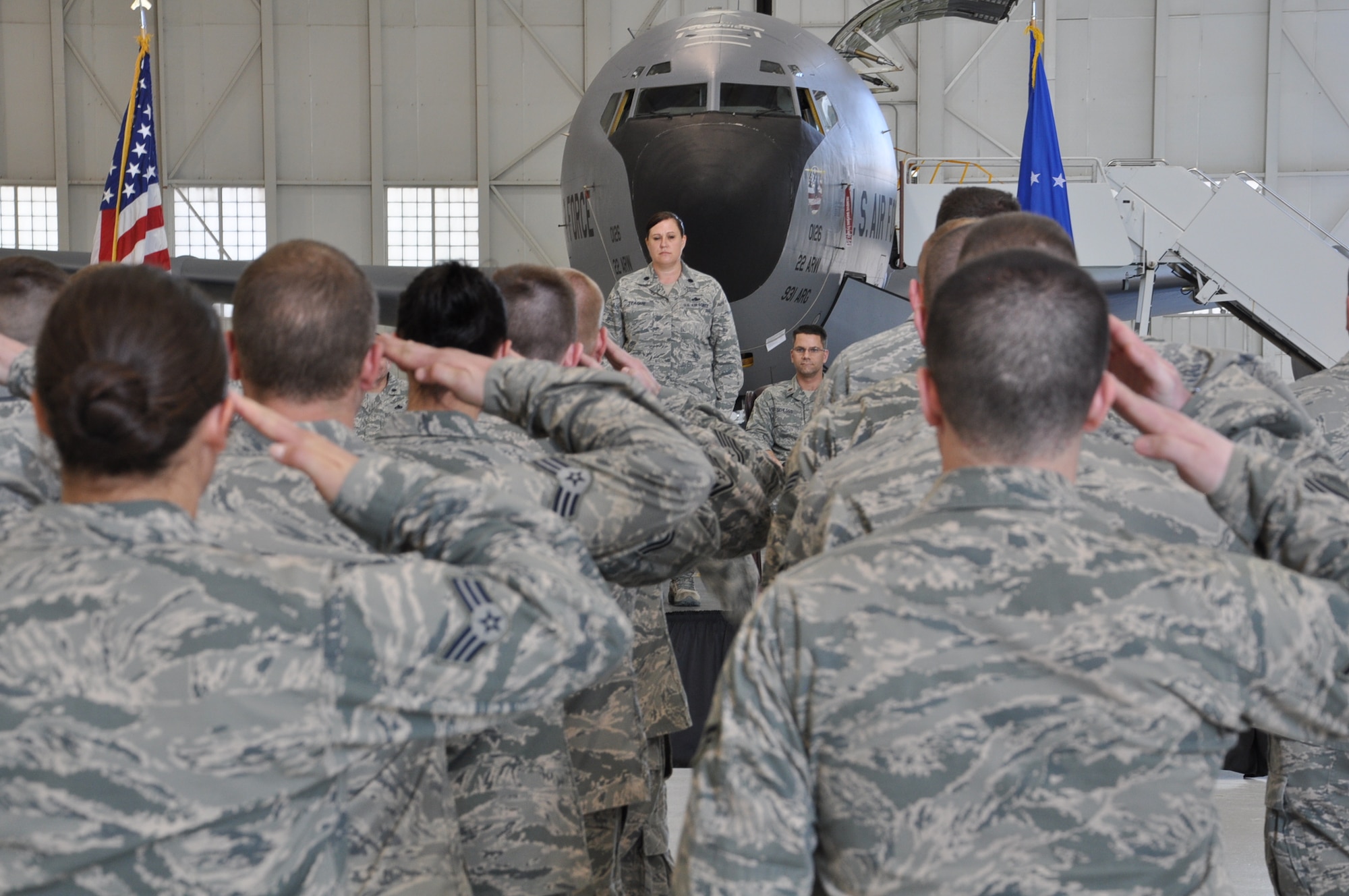 Lt. Col. Sherry Teague, the first commander of the 931st Maintenance Squadron, receives her final salute from the unit she founded in October 2009, during a change of command ceremony at McConnell Air Force Base, Kansas, April 6. Teague relinquished command to Maj. John Schloss. (Air Force photo by Master Sgt. Brannen Parrish)