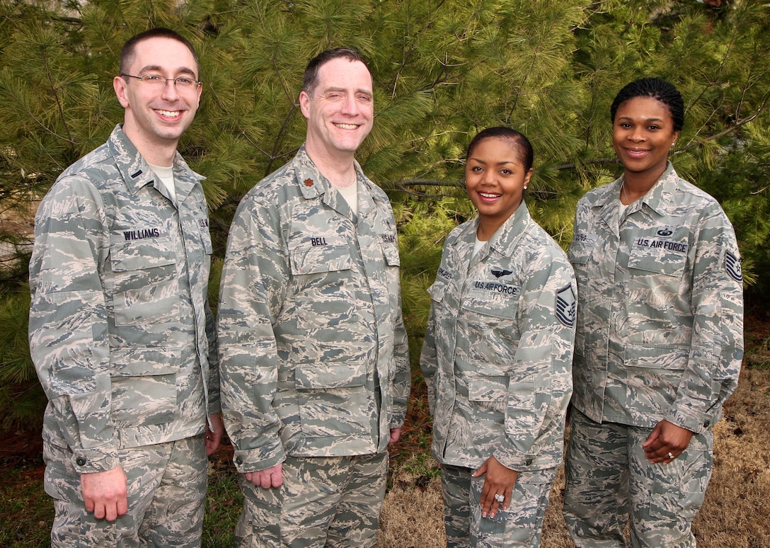 From left, First Lt. Michael Williams, Maj. Howard Bell, Master Sgt. Sharilyn Clark-Riley, and the newest member Tech. Sgt. Jonique Young.  The Chaplain's office is located in the 932nd Airlift Wing Headquarters building, 2nd floor, room 222.  (U.S. Air Force photo/ Tech. Sgt. Christopher Parr)