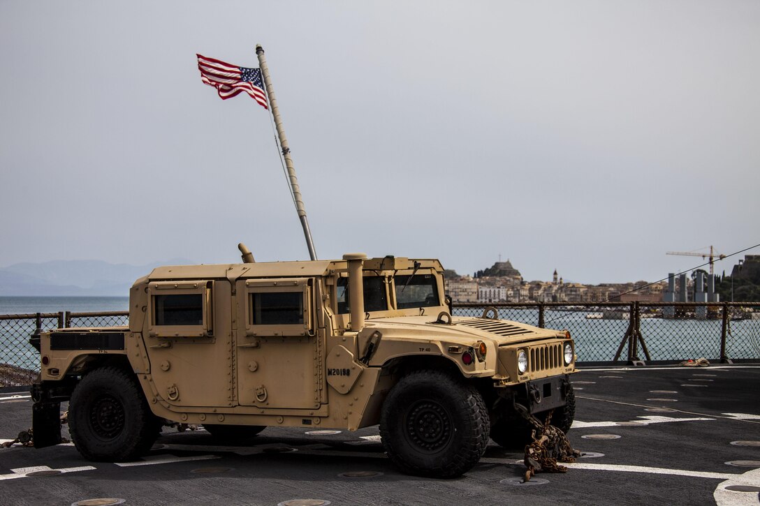 A Humvee is one of many assets carried by the Marines and Sailors from the 26th Marine Expeditionary Unit (MEU) aboard the USS Carter Hall (LSD 50) as they stop in Corfu, Greece, March 30, 2013. This is a scheduled port visit for the ship, which is currently deployed to the 6th Fleet area of operation. The MEU operates continuously across the globe, providing the president and unified combatant commanders with a forward-deployed, sea-based quick reaction force. The MEU is a Marine Air-Ground Task Force capable of conducting amphibious operations, crisis response, and limited contingency operations.
(U.S. Marine Corps photo by Staff Sgt. Edward Guevara/Released)