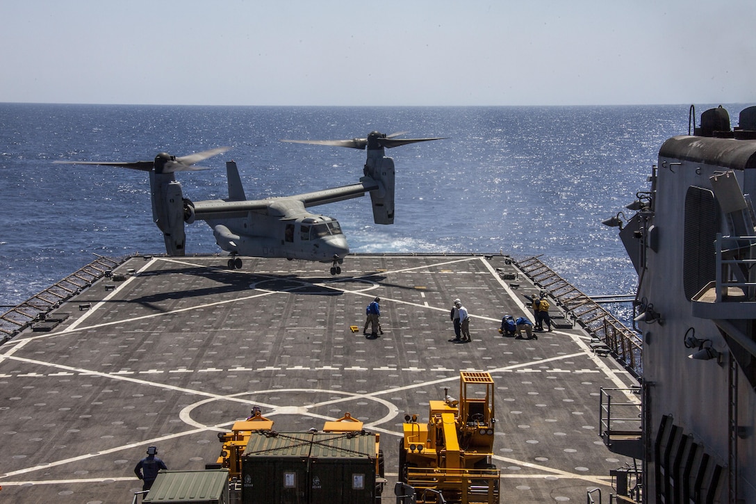 As part of an ammunition resupply, an MV-22B Osprey assigned to Marine Medium Tiltrotor Squadron (VMM) 266 (Reinforced), 26th Marine Expeditionary Unit (MEU), lands on the flight deck of the USS Carter Hall (LSD 50) while at sea April 6, 2013. The MEU is currently deployed as part of the Kearsarge Amphibious Ready Group to the 5th Fleet area of operation. The MEU operates continuously across the globe, providing the president and unified combatant commanders with a forward-deployed, sea-based quick reaction force. The MEU is a Marine Air-Ground Task Force capable of conducting amphibious operations, crisis response, and limited contingency operations.
(U.S. Marine Corps photo by Staff Sgt. Edward Guevara/Released)