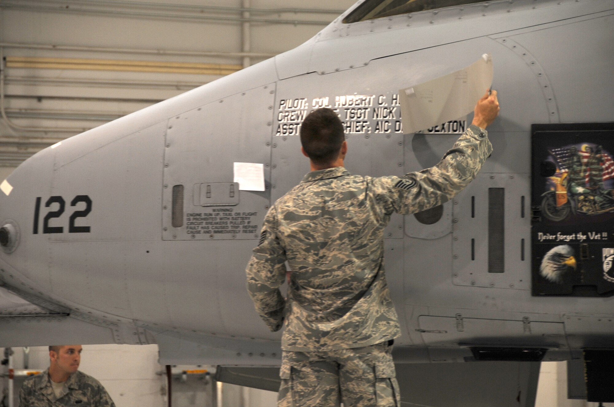 Tech. Sgt. Nick McRoberts, 442nd Aircraft Maintenance Squadron crew chief reveals Col. Herbert Hegtvedt’s aircraft  during the wing change of command ceremony, April 7, 2013. During the ceremony Col. Hubert Hegtvedt took command of the 442nd Fighter Wing from Brig. Gen. Eric Overturf. The 442nd FW is an A-10 Thunderbolt II Air Force Reserve unit at Whiteman Air Force Base, Mo. (U.S. Air force photo by Staff Sgt. Lauren Padden/Released)