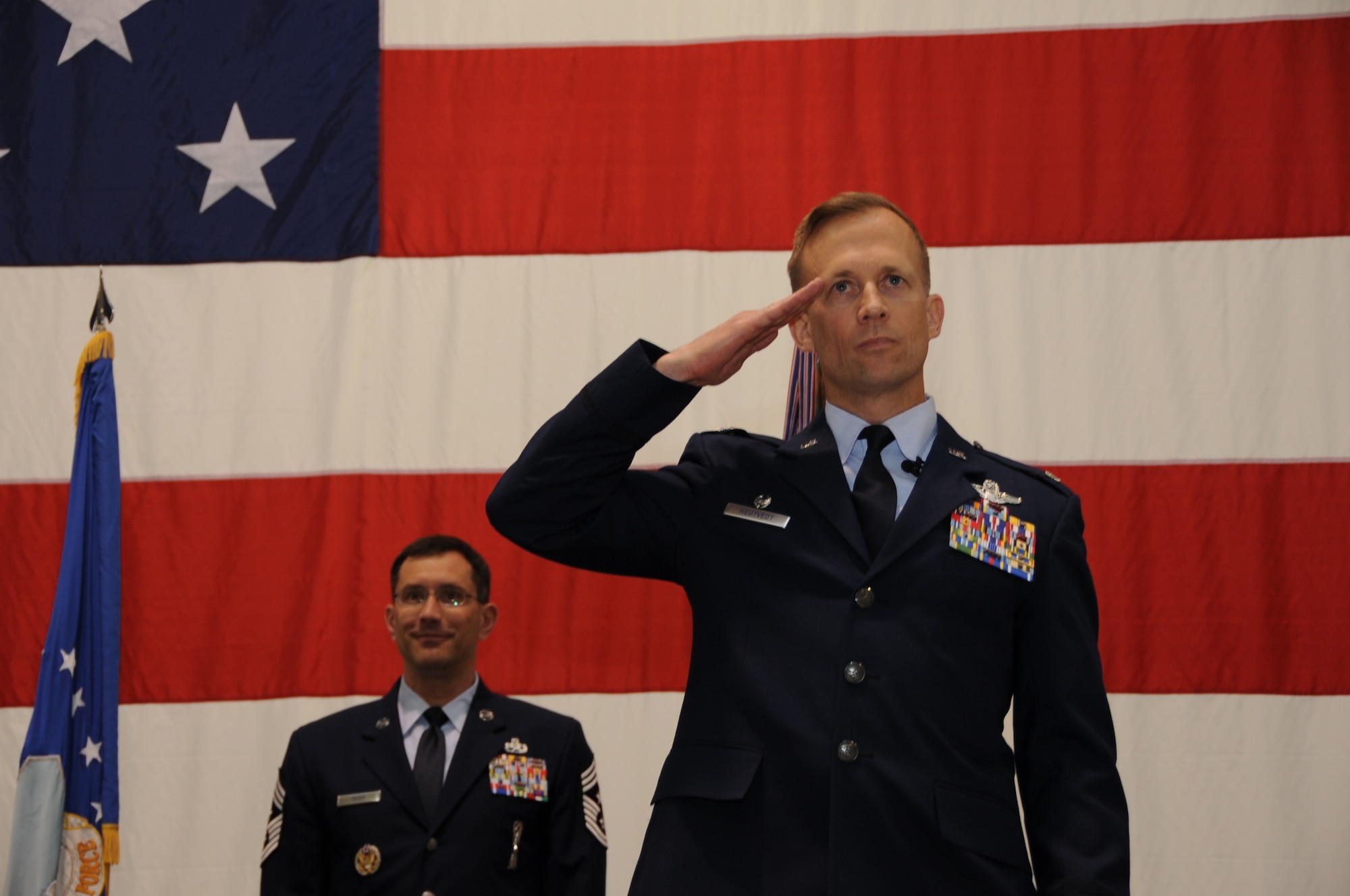 Col. Hubert Hegtvedt renders the first salute to the 442nd Fighter Wing during the wing change of command ceremony, April 7, 2013. During the ceremony Col. Hubert Hegtvedt took command of the 442nd Fighter Wing from Brig. Gen. Eric Overturf. The 442nd FW is an A-10 Thunderbolt II Air Force Reserve unit at Whiteman Air Force Base, Mo. (U.S. Air force photo by Staff Sgt. Lauren Padden/Released)