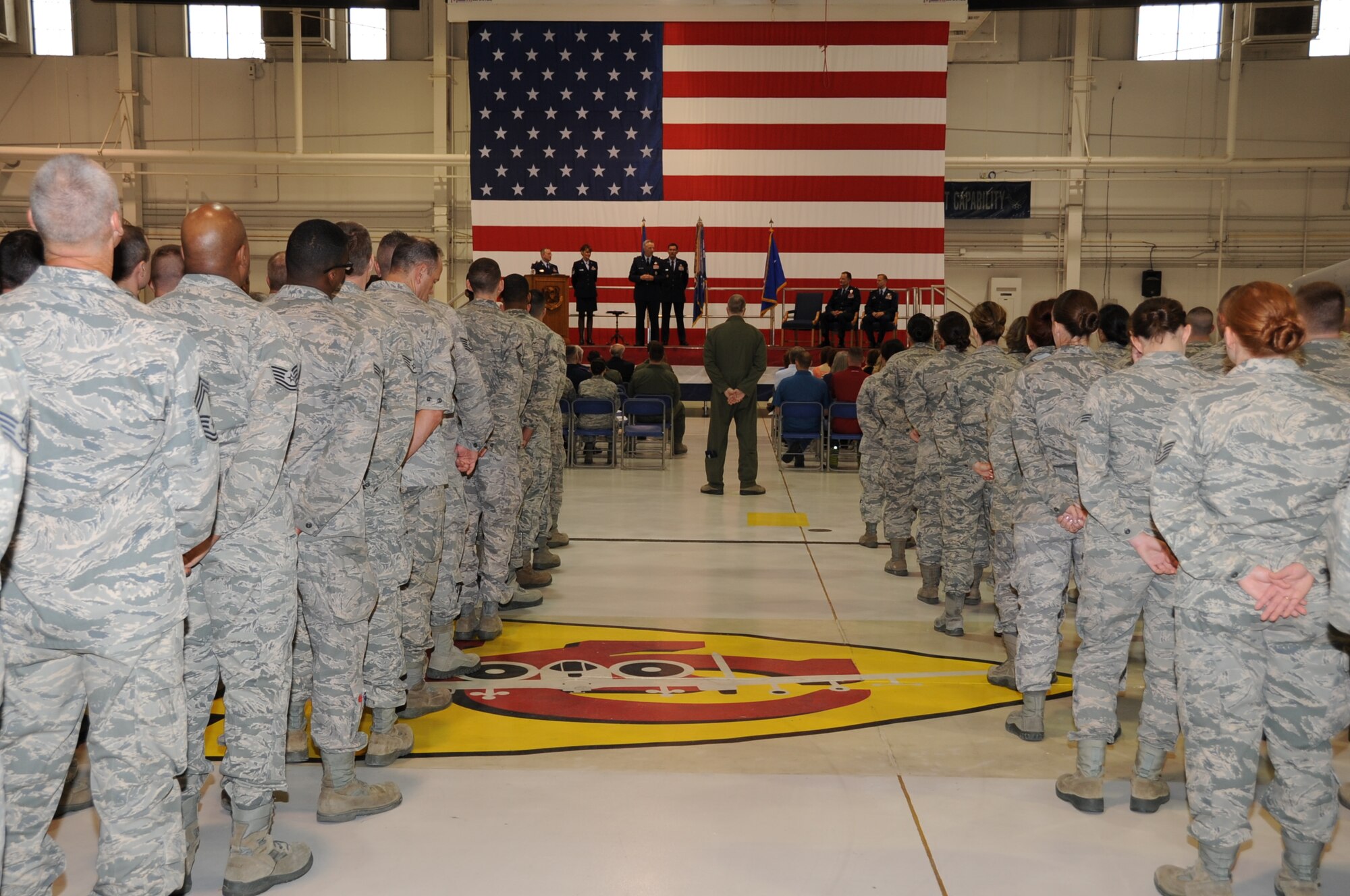 Members of the wing stand in formation as Maj. Gen. William Binger, 10th Air Force commander, speaks during the 442nd Fighter Wing change of command ceremony, April 7, 2013. During the ceremony Col. Hubert Hegtvedt assumed command of the 442nd Fighter Wing from Brig. Gen. Eric Overturf. The 442nd FW is an A-10 Thunderbolt II Air Force Reserve unit at Whiteman Air Force Base, Mo. (U.S. Air force photo by Staff Sgt. Lauren Padden/Released)