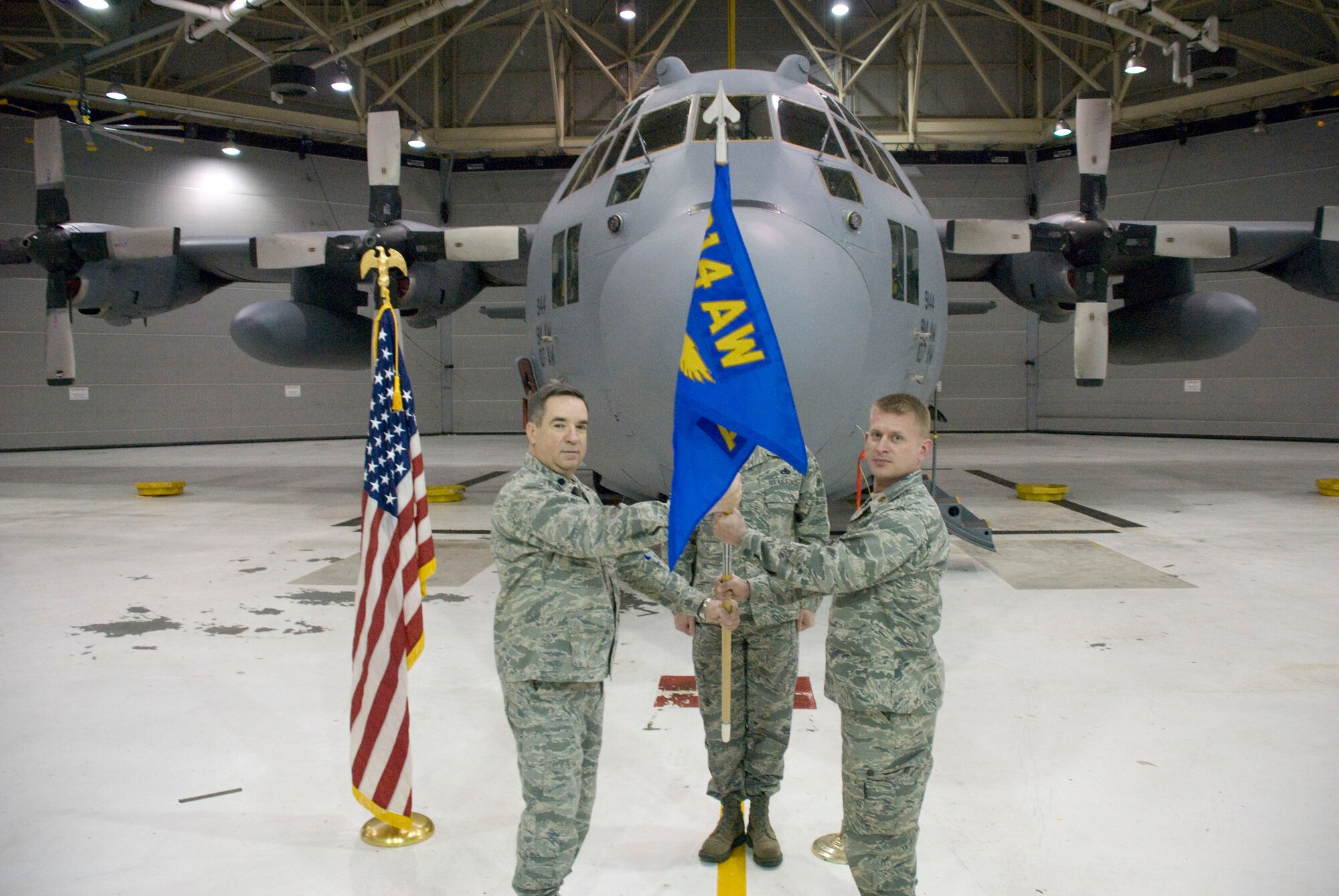 Maj. Trevor  Sthultz (right) receives the 914th Aircraft Maintenance Squadron guidon from Maintenance Group Commander Lt. Col James Bayone and thereby assuming command of the squadron at the Niagara Falls Air Reserve Station, N.Y. April 6, 2013.  Stultz, who came to Niagara from Wright-Patterson Air Force Base in Ohio, will command more than 60 Airmen in the 914th AMXS. (U.S. Air Force photo by Tech. Sgt. Andrew Caya) 