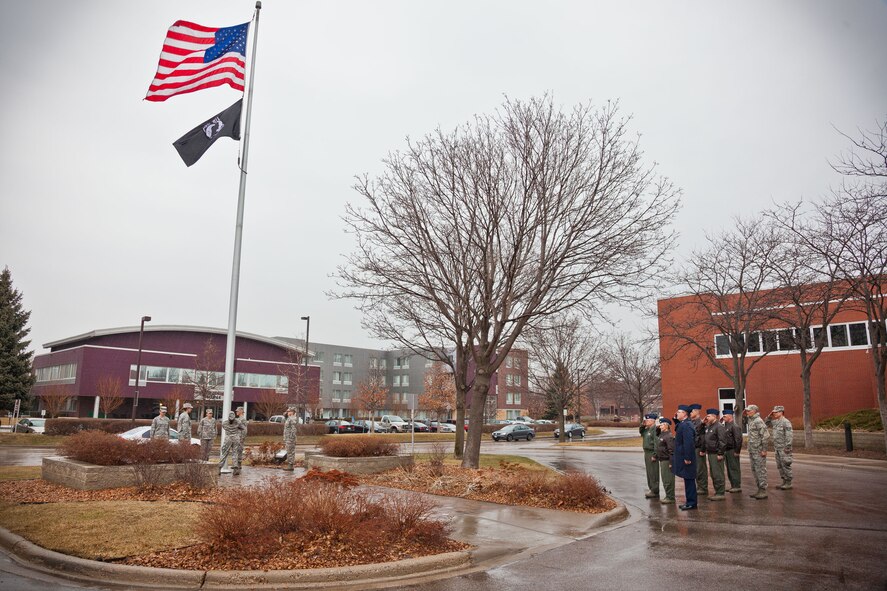 Airmen from the 934th Aeromedical Evacuation Squadron perform the retreat ceremony on Saturday of the Unit Training Assembly weekend at the Minneapolis-St. Paul Air Reserve Station, Minn. (U.S. Air Force photo/Shannon McKay)