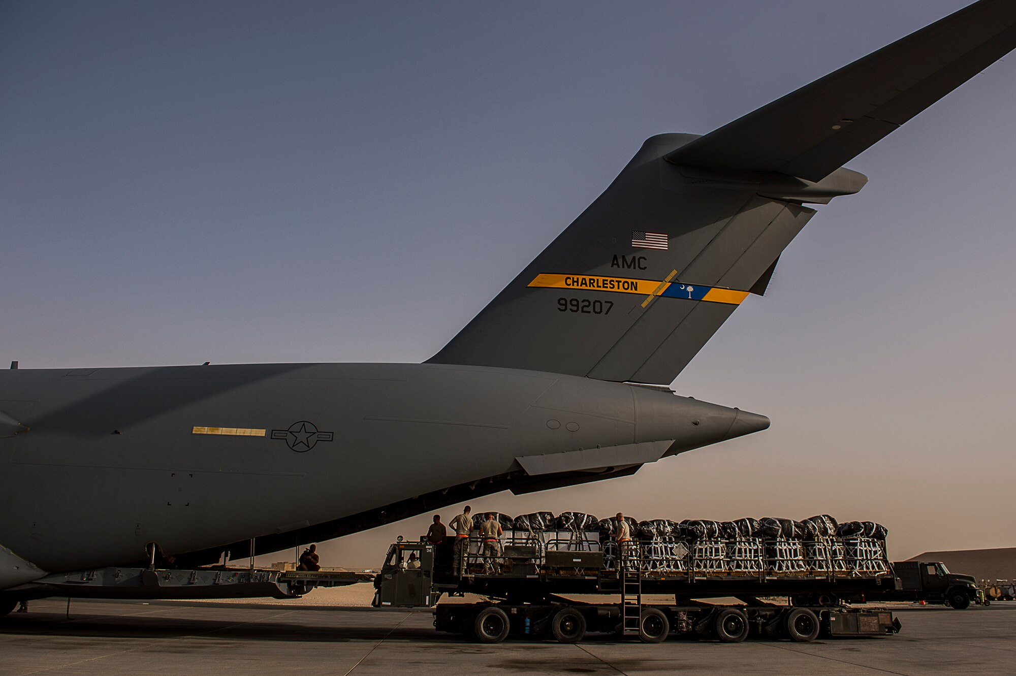 Airmen from the 816th Expeditionary Airlift Squadron load supply pallets on a C-17 Globemaster III for an airdrop mission, March 30, 2013. The bundles were air dropped to a forward operating base in Afghanistan. (U.S. Air Force photo/Tech. Sgt. Dennis J. Henry Jr.)
