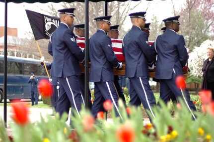 Members of the U.S. Air Force Honor Guard carry the remains of Maj. Perry Jefferson into the Old Chapel on Ft. Myer, Va., April 3, 39 years after Jefferson went missing in action in Vietnam.