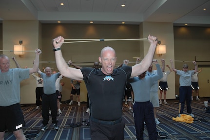 Tennessee Army National Guard Staff Sgt. Ken Weichert leads the Army and Air Guard senior enlisted leaders through a strenuous workout in Saratoga Springs, N.Y., in April. He is better known as "Sgt. Ken" in GX Magazine.