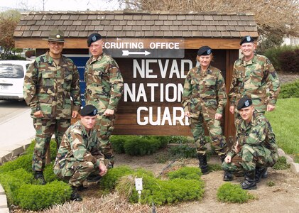 Nevada Army Guard Soldiers at the Plumb Lane Armory in Reno, Nev., dug deep into their closets Wednesday to mark the end of the Battle Dress Uniform era. From left, Staff Sgt. Elias Perez, Sgt. Lukas Haagland, Sgt. Eric Hintermeyer, Staff Sgt. Gloria Rems, Staff Sgt. Richard Gilberti and Staff Sgt. Ivan Parsons model the outfit that served as the Army's principal duty uniform from 1981-2005.