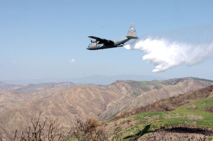 A C-130 Hercules cargo plane assigned to the 145th Airlift Wing, North Carolina Air National Guard, drops 3,000 gallons of water using Modular Airborne Fire Fighting System (MAFFS) during the MAFFS 2008 annual certifying event. The annual training event includes all aircrew, maintenance, support personnel directly supporting the MAFFS mission. There are 4 Air National Guard and Air Force Reserve units involved with MAFFS: 145th Airlift Wing, (Charlotte), 146th Airlift Wing (Channel Islands), 153rd Airlift Wing, (Wyoming) and the 302nd Airlift Wing (Colorado).P