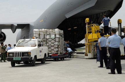 Earthquake relief supplies from the United States are unloaded May 18 at the Shuangliu International Airport in Chengdu, China. Two Air Force C-17 Globemaster III aircraft delivered food, water containers, blankets, generators, lanterns and various hand tools, which were taken immediately to earthquake areas. Secretary of Defense Robert Gates, in support of the U.S. Department of State, authorized U.S. Pacific Command to support earthquake relief efforts in the People's Republic of China.