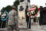 Army Lt. Col. George Kranske, commander of 2nd Battalion, 156th Infantry Regiment of the Lousiana Army National Guard steps up to honor the fallen Soldiers of his battalion as well as those of the Royal Thai Army during a memorial wreath laying ceremony held during the 2008 Cobra Gold exercise held in May.