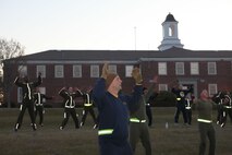 Marines and sailors endure a strenuous physical training session with Sgt. Maj. George W. Young Jr., 2nd Marine Logistics Group’s top Marine enlisted advisor, aboard Camp Lejeune, N.C., March 28, 2013. After nearly an hour of circuit training, the participants hit the Camp Lejeune streets for a four-mile run. (U.S. Marine Corps photo by Lance Cpl. Shawn Valosin)