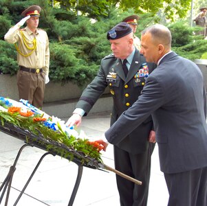 LTG H Steven Blum, the chief of the National Guard Bureau, and Donald Loren, deputy assistant secretary of defense for homeland security integration, pay their respects during a wreath-laying ceremony at the Bulgarian Tomb of the Unknown Soldier in Sofia, Bulgaria, on June 2, 2008. Blum and Loren were visiting Sofia for the National Guard State Partnership Program (SPP) Southeast Europe Regional Workshop. The SPP pairs National Guards of U.S. states with foreign countries for military-to-military, military-to-civilian and civil security cooperation.