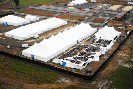 Visible storm damage to temporary military housing at a remote training site after a series of severe storms passed through Sunday evening. Soldiers from the Illinois National Guard are conducting pre-mobilization training for an upcoming deployment in support of Operation Enduring Freedom. Several Soldiers were injured; no injuries were serious. 