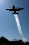 A C-130 Hercules cargo plane assigned to the 145th Airlift Wing, North Carolina Air National Guard, drops 3,000 gallons of water over the Los Padres National Forest, Calif., May 7 using a modular airborne fire fighting system (MAFFS) during the MAFFS 2008 Annual Certifying Event. The training event included all aircrew, maintenance and support personnel directly supporting the MAFFS mission. There are four Air National Guard and Air Force Reserve units involved with MAFFS: 145th Airlift Wing, (Charlotte), 146th Airlift Wing (Channel Islands), 153rd Airlift Wing, (Wyoming) and the 302nd Airlift Wing (Colorado).