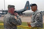 LTG H Steven Blum, chief of the National Guard Bureau, overlooks the wildfire response operations of two North Carolina National Guard C-130 Hercules aircraft from the 145th Airlift Wing with Maj. Gen. William Wade, adjutant general of California, on the airfield at Chico, Calif., on June 26, 2008.