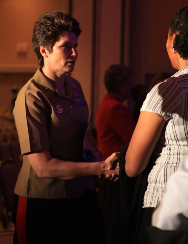 Brig. Gen. Lori E. Reynolds, commander of Marine Corps Recruit Depot Parris Island, S.C., meets audience members during the 2013 Women’s Basketball Coaches Association National Conference on April 8, 2013 at the New Orleans Marriott hotel. Reynolds, the session’s keynote speaker, spoke about the importance of leadership development in young people. 