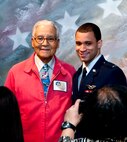 Retired Air Force Col. Charles McGee, left, a Tuskegee Airman, attends the graduation of new Air Force pilot 2nd Lt. Marcel Trott, April 5, at Vance Air Force Base, Okla. (U.S. Air Force photo/ Terry Wasson)