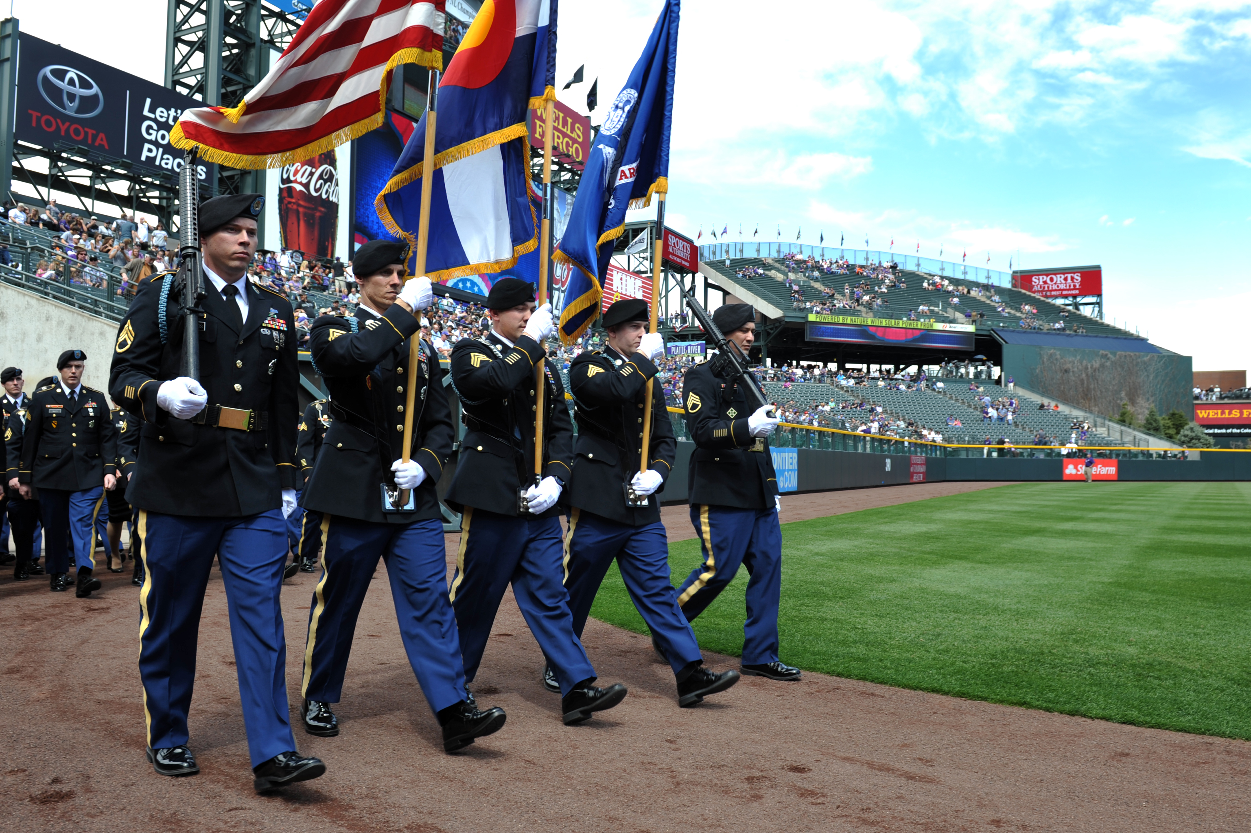 Service members participate in Colorado Rockies Opening Day