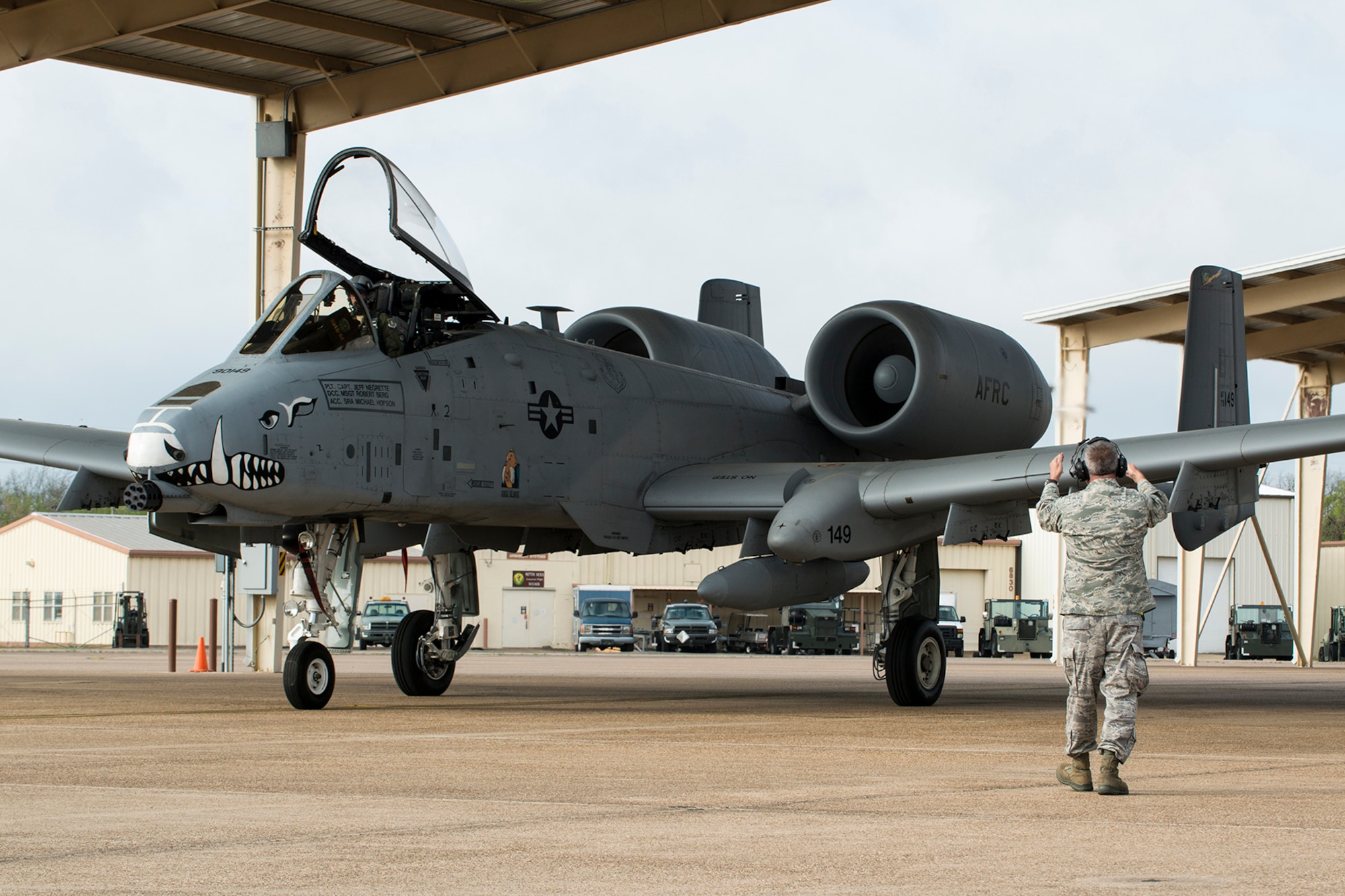 U.S. Air Force Tech. Sgt. Robert Berg marshals his A-10 Thunderbolt II for the last time, April 8, 2013, Barksdale Air Force Base, La. Berg has been the crewchief of this aircraft for two years and it among the first three selected to leave the base in preparation of the inactivation of the 917th Fighter Group. (U.S. Air Force photo by Master Sgt. Greg Steele/Released)