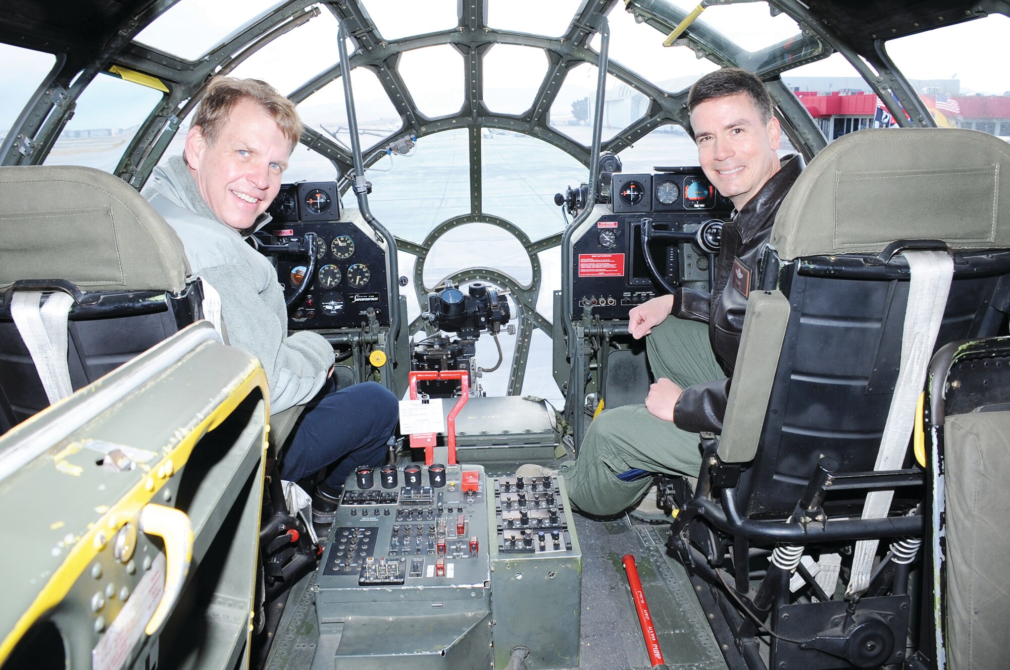 Col. Paul Tibbets IV, Air Force Inspection Agency commander, right, and Steve Paternoster, Kirtland AFIA honorary commander, toured and flew in the B-29 Superfortress “Fifi” during its April 3 visit to Albuquerque. “Fifi,” the world’s only flying B-29, regularly tours nationwide to promote Air Force heritage. (U.S. Air Force photo by Todd Berenger)
