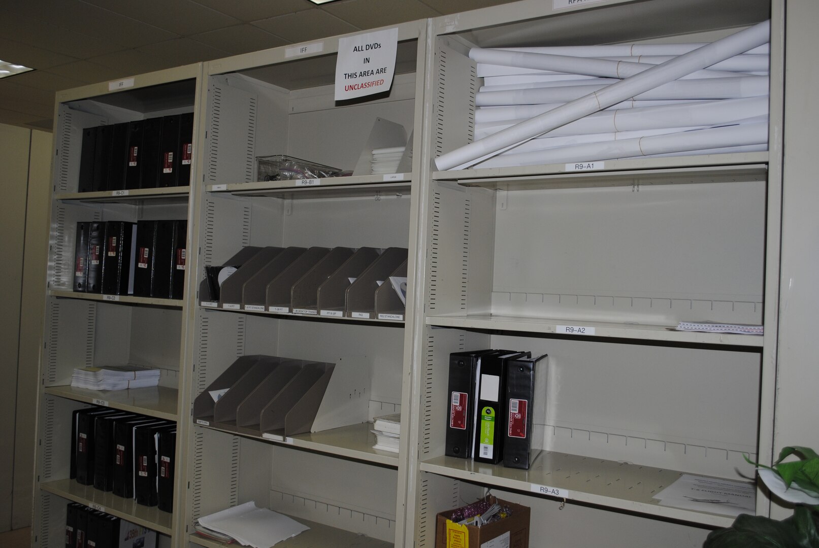 These bare bookshelves were once filled with numerous publications. Since August 2012, the 12th Operations Support Squadron Bookstore has worked to convert all publications to CDs and develop an online publication database. (U.S. Air Force Photo by Capt. Ashley Walker)