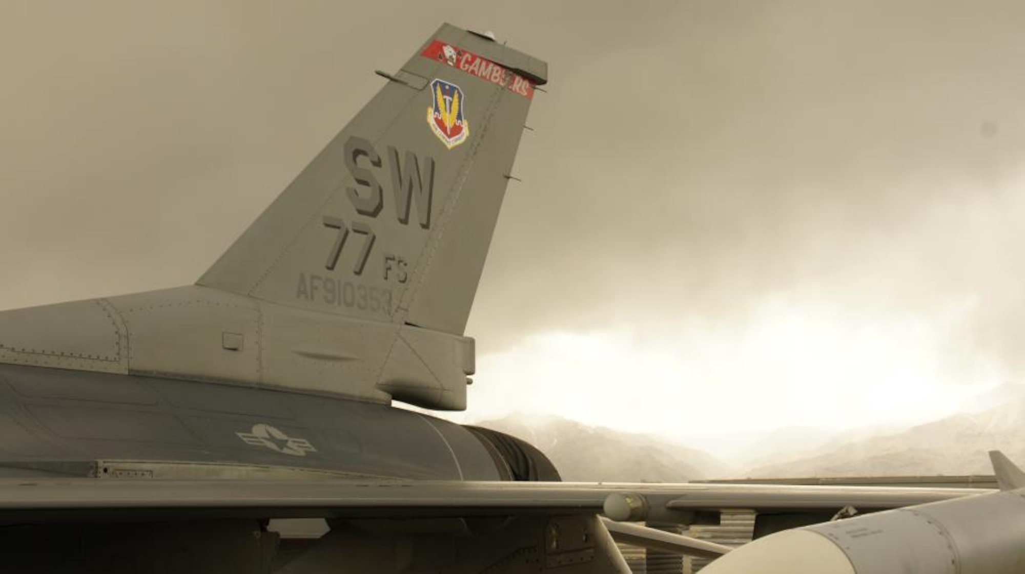 A U.S. Air Force F-16 Fighting Falcon assigned to the 77th Fighter Squadron sits on the runway in Afghanistan.  The unit conducts close air support missions.  (U.S. Air Force Photo by Capt. Elijah Supper/Released)