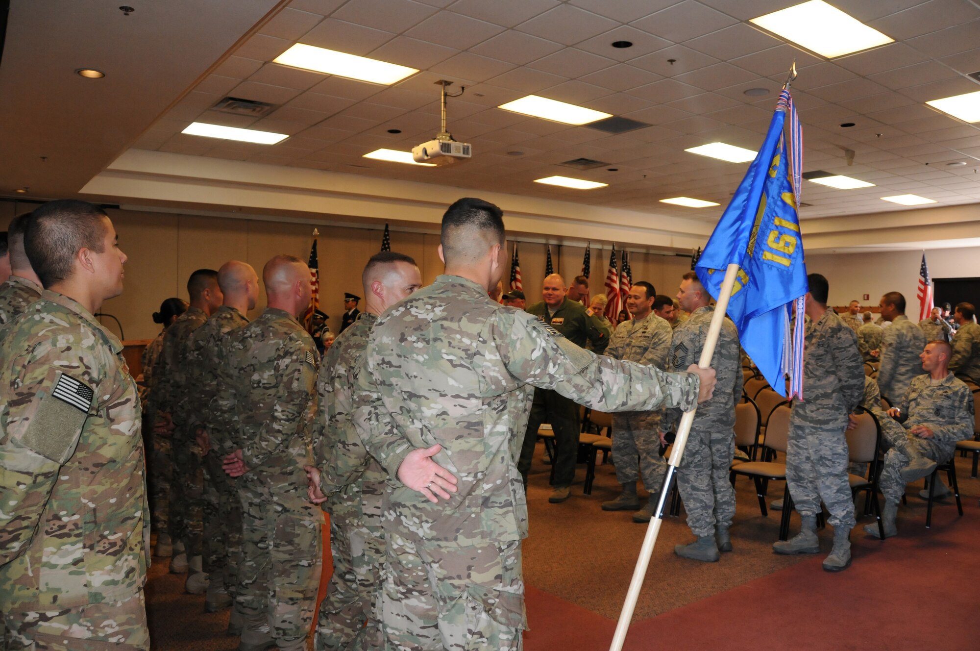 The 161st Air Refueling Wing came together to honor the 161st Security Forces Squadron as they head for their Mobilization Training at Creech, Nev., and then on to Afghanistan in a ceremony April 6, 2013. (Air National Guard photo by Tech. Sgt. Susan Gladstein/Released)