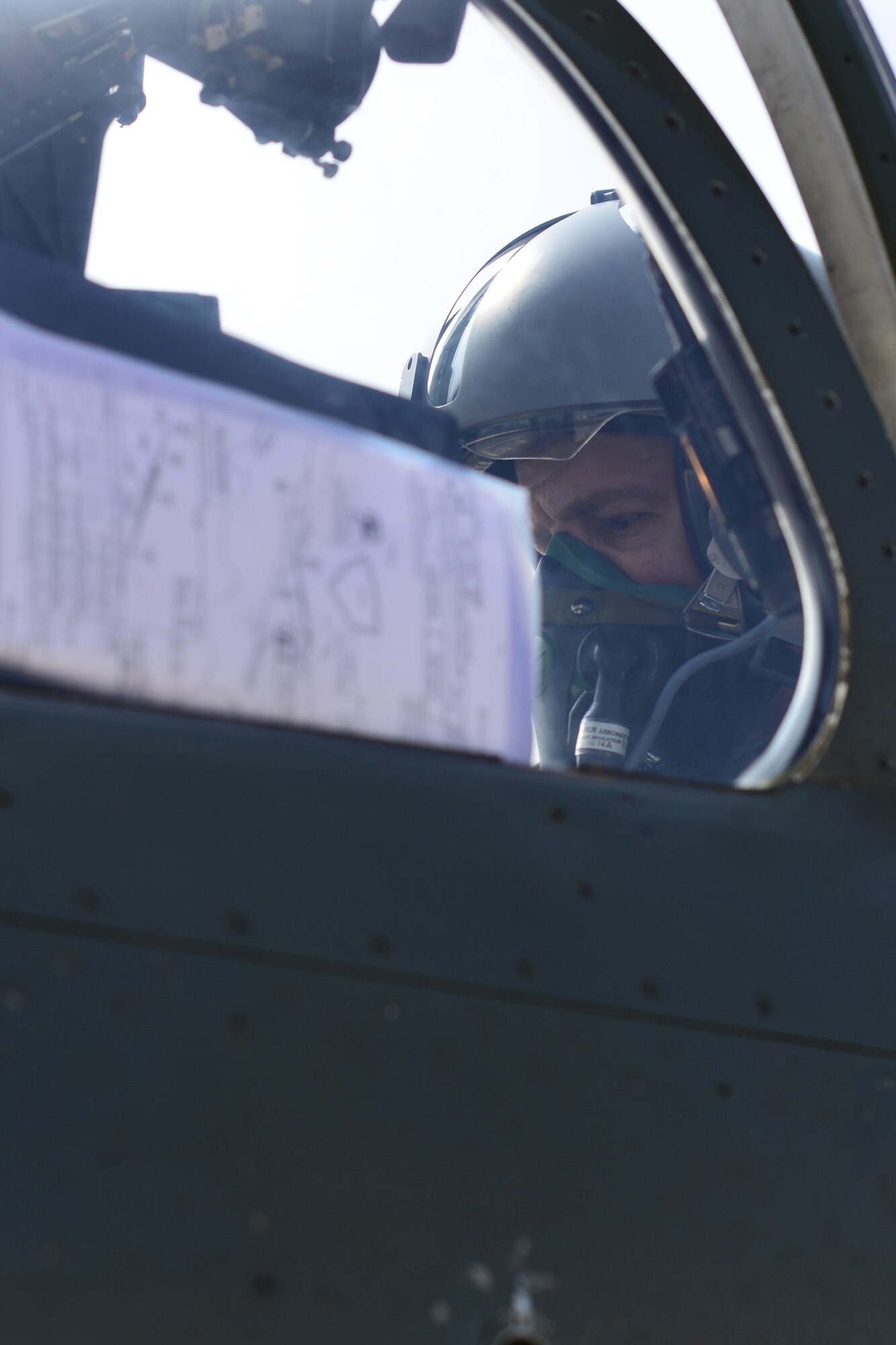 A French pilot runs through his pre-flight checklist for his F-1 Mirage before he takes off from Ramstein Air Base, Germany, April 4, 2013. The three French pilots and two Mirages, were here to conduct a familiarization flight and attend a planning and preparation conference at NATO's Headquarters, Allied Air Command, related to the French air force four-month Baltic Air Policing deployment starting in May. (U.S. Air Force photo/Tech. Sgt. Chad Thompson)