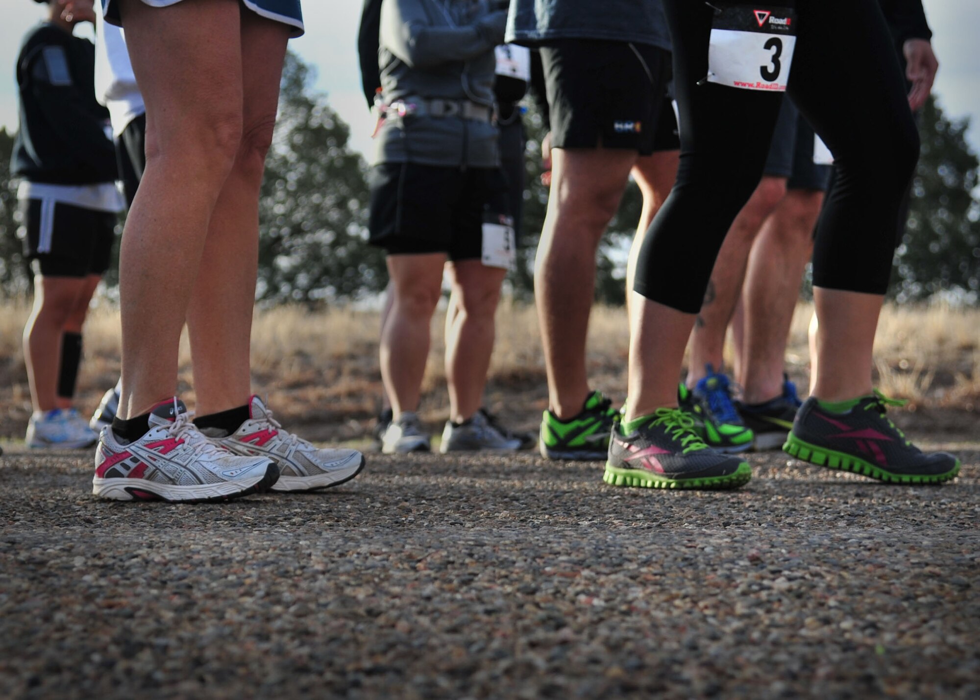 Runners in the 1st Annual Run for Heroes line up at the starting line before the race at Ned Houk Park in Clovis, N.M., April 6, 2013. The event featured a 5 and 10K, as well as a 400M dash for children and drew in members stationed at Cannon Air Force Base, N.M., as well as the surrounding communities. (U.S. Air Force photo/Senior Airman Alexxis Pons Abascal) 