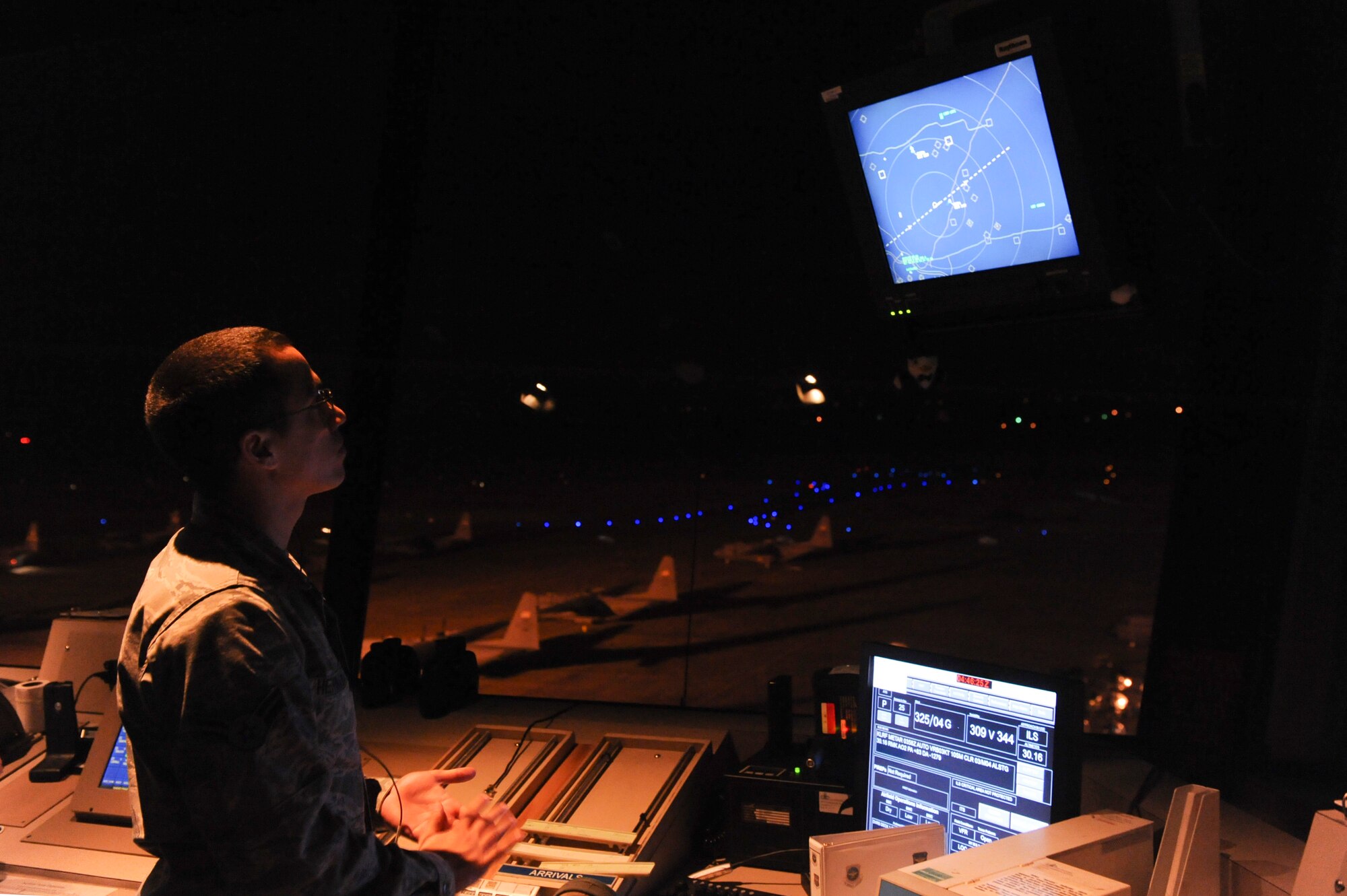 Airman 1st Class Labrieo Hernandez, a 19th Operations Support Squadron air traffic controller apprentice, sequences inbound aircraft Feb. 28, 2013, at Little Rock Air Force Base, Ark. Hernandez uses this procedure to determine the order of the aircraft entering the runway. (U.S. Air Force photo by Senior Airman Rusty Frank)