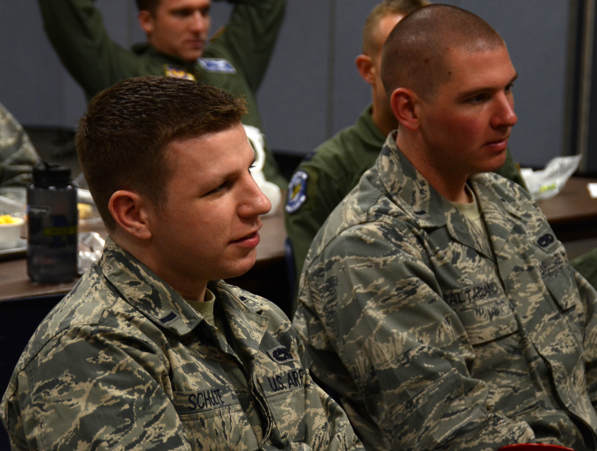 First Lts. Anthony Caltabiano, 86th Maintenance Operations Squadron flight commander, and Douglas Schulte, 86th Maintenance Squadron flight commander, attend a professional development event at Ramstein Air Base, Germany, April 4, 2013. The event was hosted by the Kaiserslautern Military Community Company Grade Officers' Council. (U.S. Air Force photo / 2nd Lt. Kay M. Nissen)